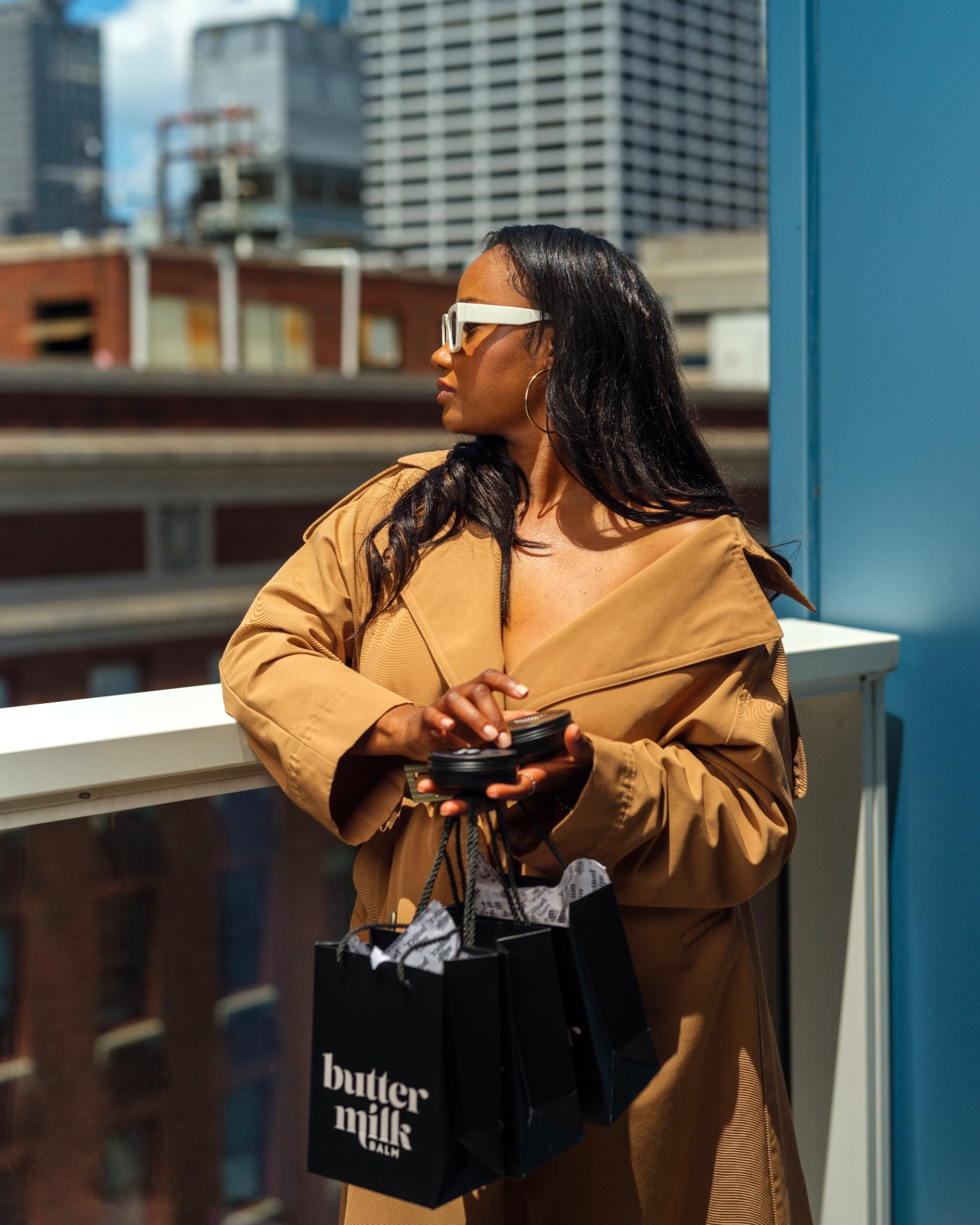 Buttermilk Balm gift bags with city skyline